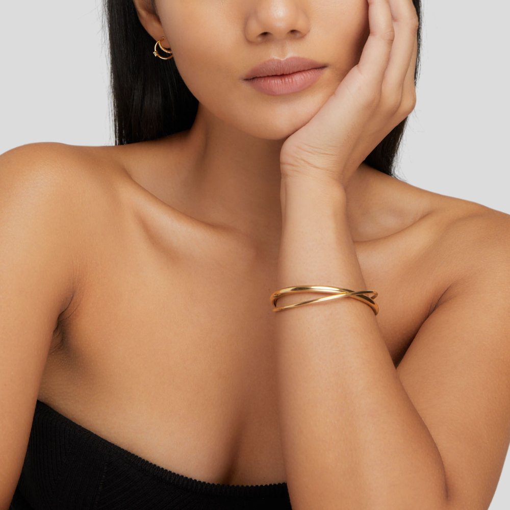Goldener Twist-Armreif