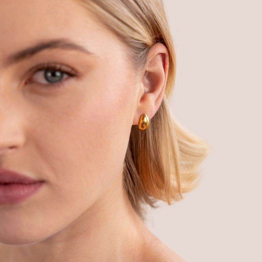 Elegante Goldene Kurven-Ohrstecker