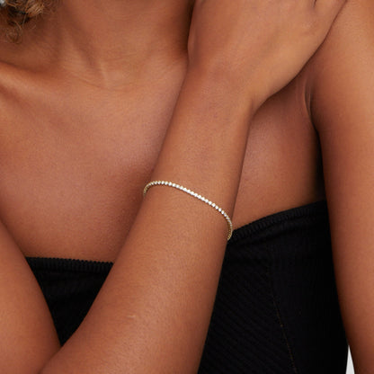 Funkelndes Tennisarmband in Gold