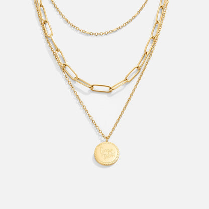 Mehrreihige Goldkette mit Münzanhänger