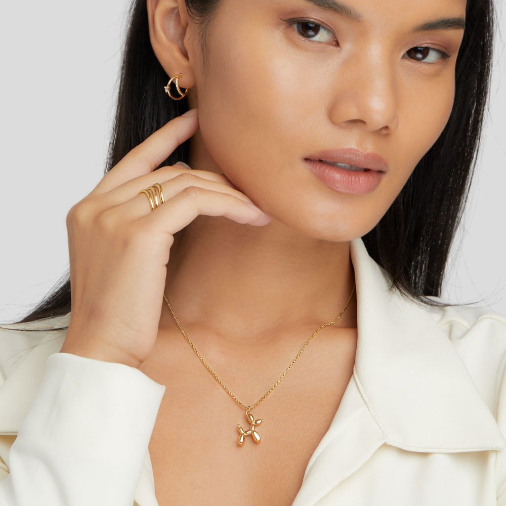 Goldene Halskette mit Ballonhund-Anhänger