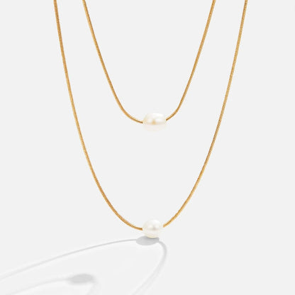 Goldene Doppelkette mit Süßwasserperlen